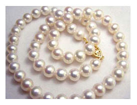 Mikimoto pearls courtesy Astro Jewelry; pearls promise good fortune and longevity. 