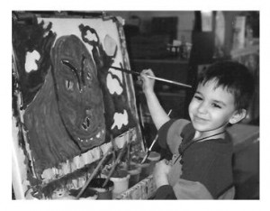 Little boy painting