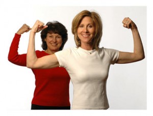 Women flexing their muscles