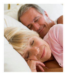 Mature couple sleeping