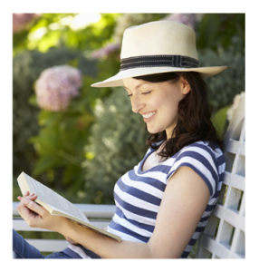 Woman Reading Book in Garden