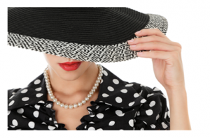 Woman in hat with pearl necklace