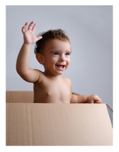 Smiling Baby in a Box