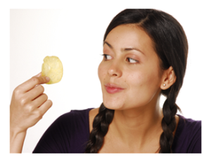 Woman Staring Down a Potato Chip