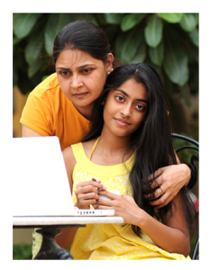 Indian Mother and Daughter Looking at Computer