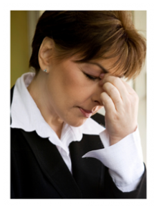 Tired and Stressed Woman at the Office