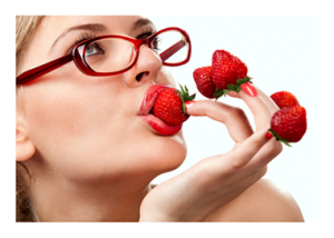 Woman Delighting in Strawberries