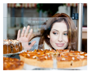 Woman Wanting Cake at Bakery