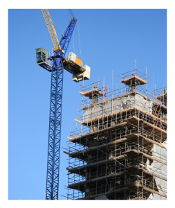 Crane at Tall Building Under Construction