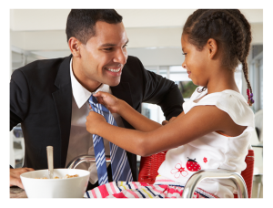 Father and Young Daughter at Breakfast