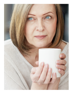 Thoughtful Woman Holding Coffee