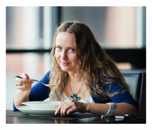 Woman Eating Soup