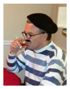 Frenchman sipping cognac