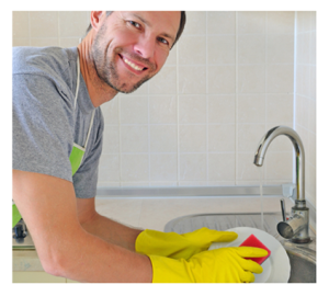 Smiling Man Doing Dishes