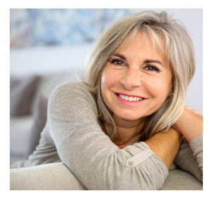Smiling Mature Woman Leaning on Couch
