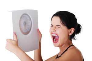 Frustrated Woman With a Scale