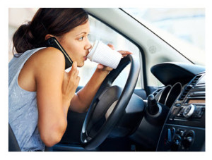 Woman Working and Talking While Driving