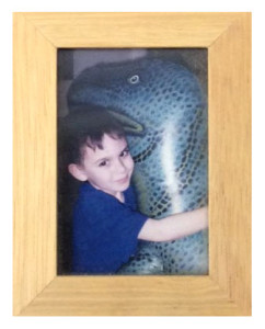 Little Boy With Dinosaur