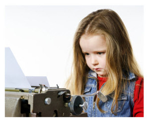 Little Girl on Vintage Typewriter