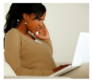 Woman Thinking About What She Is Writing