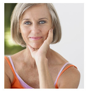 Smiling Middle Age Woman in Orange Shirt