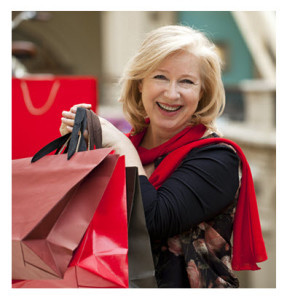 Happy Mature Woman With Shopping Bags