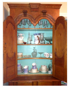 Grandmothers china in antique cupboard