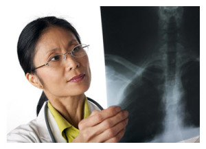 Physician Looking at X-rays