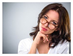 30 Year Old Woman Looking Over Her Glasses