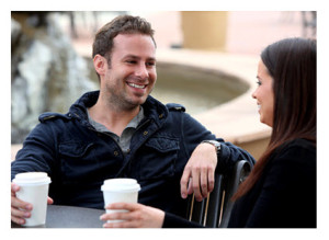 Couple Having Coffee Outside