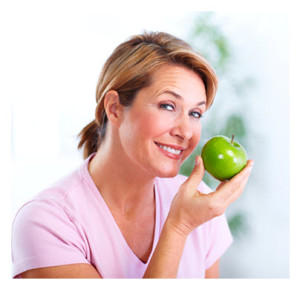 Healthy Organic Eating_Smiling Woman Holding an Apple