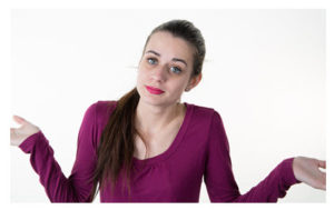 woman-shrugging_purple-shirt